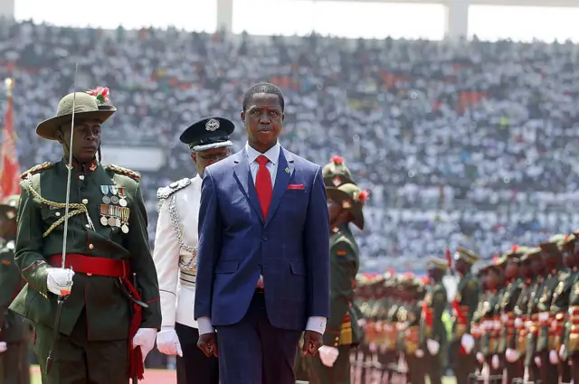 Zambian Elected incumbent President Edgar Lungu (C) is escorted as he arrives to swear in as President at Heroes Stadium in Lusaka on September 13, 2016 in Lusaka