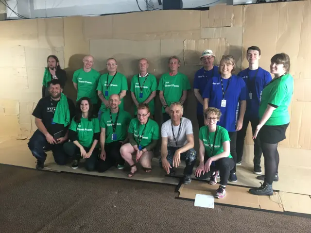 Karl Hyde with the MIF volunteer army, as they create Manchester Street Poem