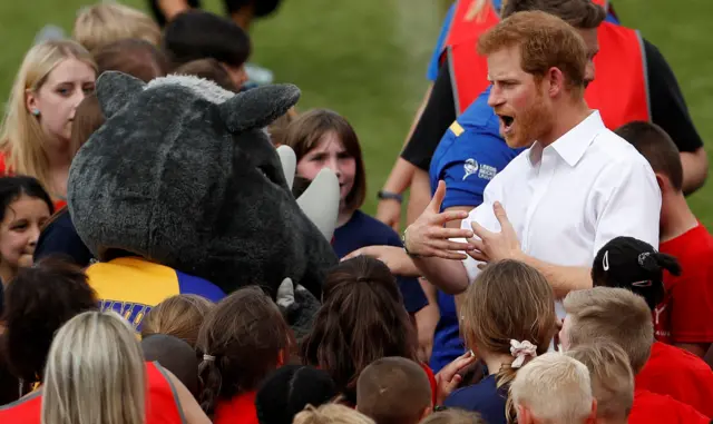 Prince Harry meets Ronnie the Rhino