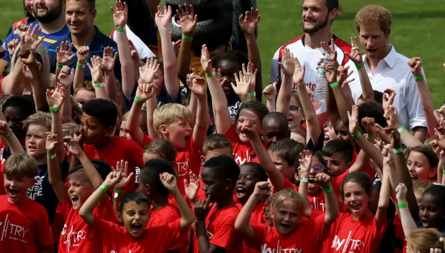 Prince Harry with kids at Headingley