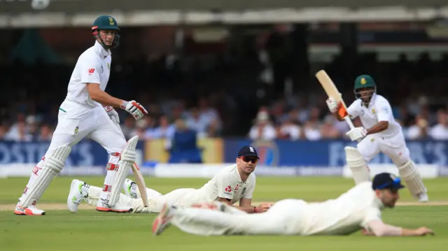 England's James Anderson looks on