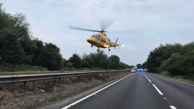 Air ambulance landing near crash
