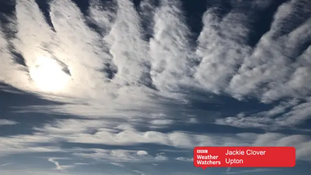 White clouds in the sky with sunlight