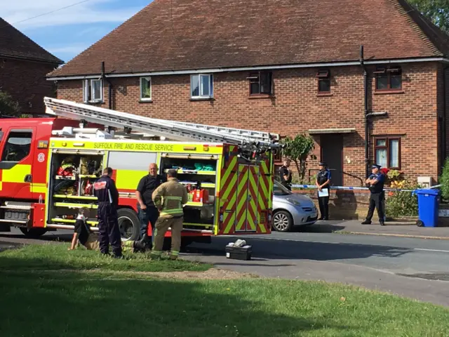 Emergency services outside scene of fire