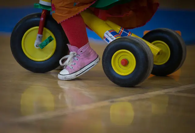 Child on a tricycle