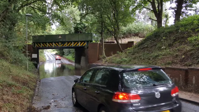 Flooding under the rail bridge in Brundall