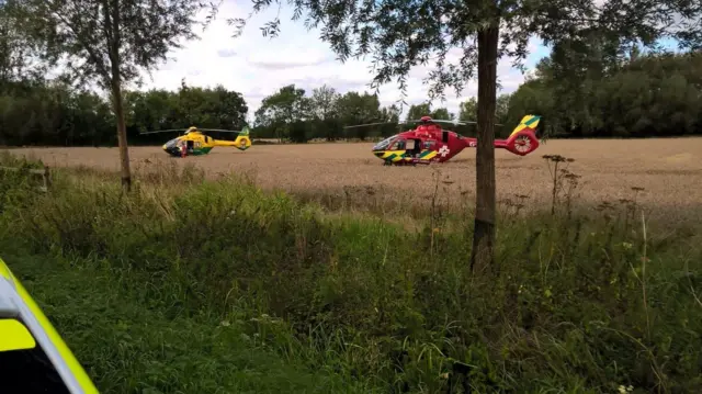 Air ambulances in a field