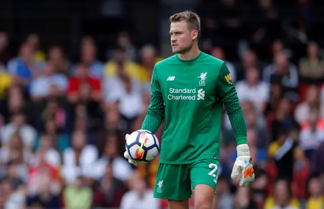 Simon Mignolet holds the ball