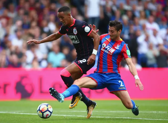 Joel Ward of Crystal Palace tackles Tom Ince