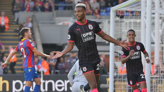 Steve Mounie of Huddersfield Town celebrates