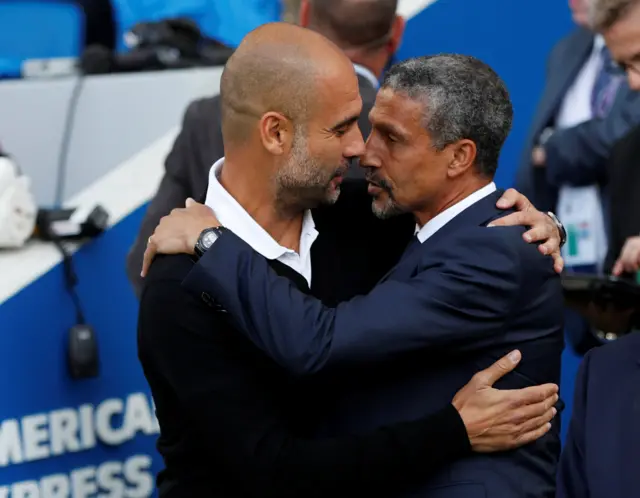 Chris Hughton and Pep Guardiola