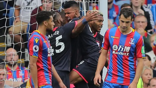 Elias Kachunga of Huddersfield Town celebrates scoring the opening goal