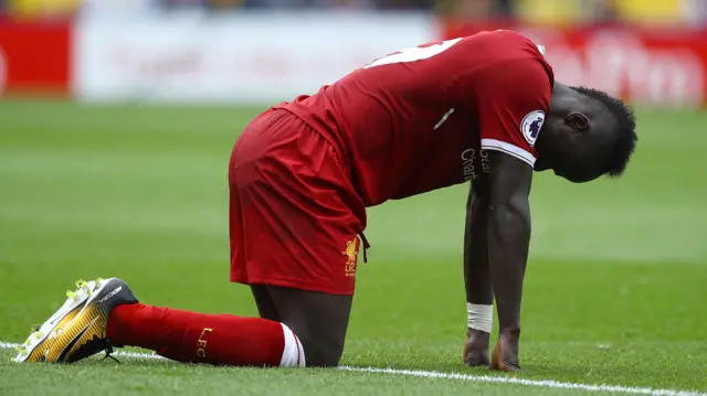 Sadio Mane of Liverpool shows a look of dejection