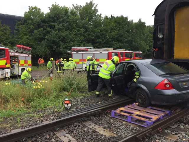 Train hits car