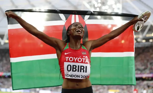 Helen Obiri with flag