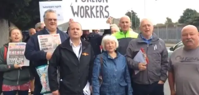 People protesting with placards in Hull