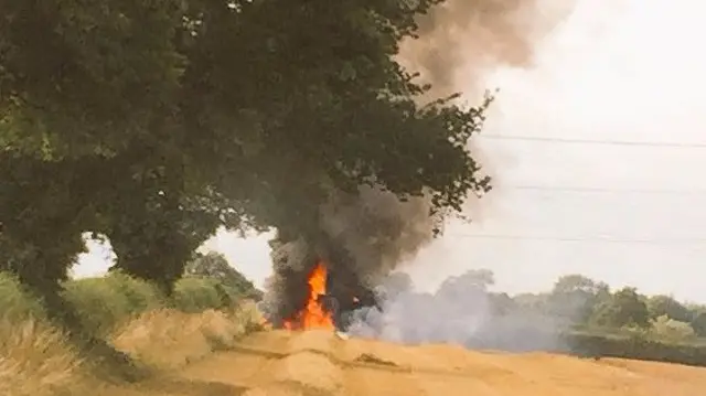 Combined Harvester involved in Fire