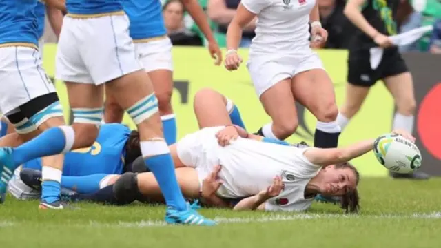 Scarratt scoring one of her tries