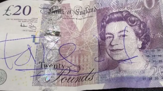 One of the "fake bank notes"