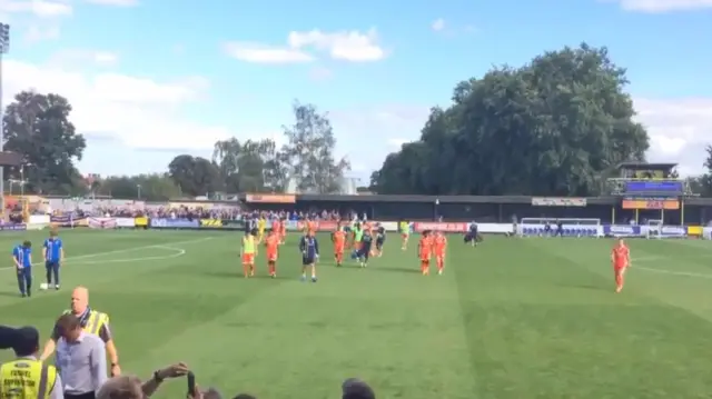 Shrewsbury players walk off