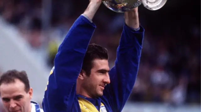 Eric Cantona winning the league with Leeds