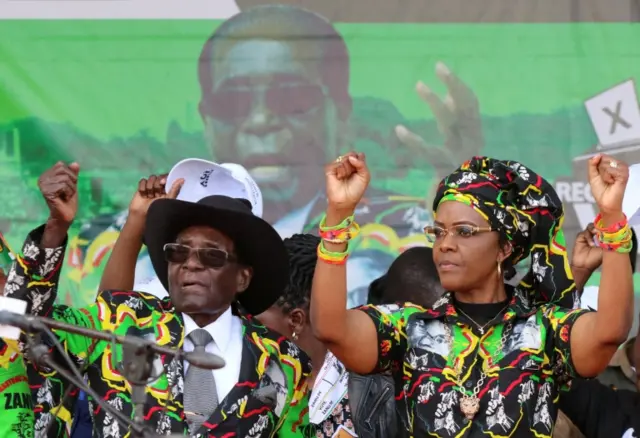 President Robert Mugabe and his wife Grace attend a rally of his ruling ZANU (PF) in Chinhoyi, Zimbabwe, July 29, 2017.