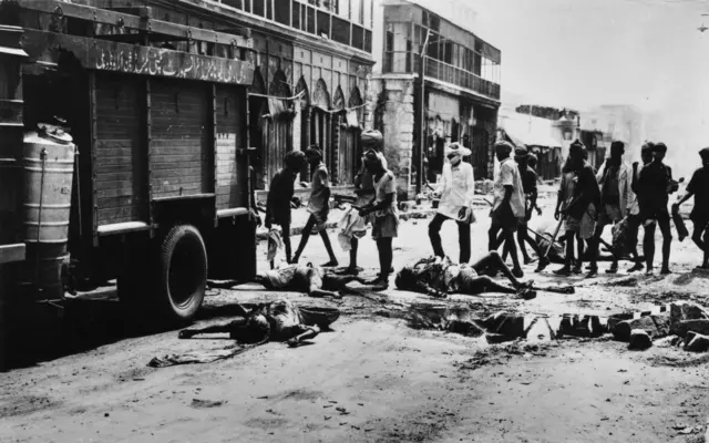 Victims of the riots in Delhi being removed from the streets. Fighting broke out over Partition