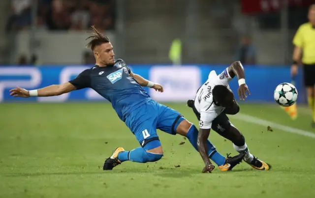 Ermin Bicakcic of Hoffenheim (l) and Sadio Mane