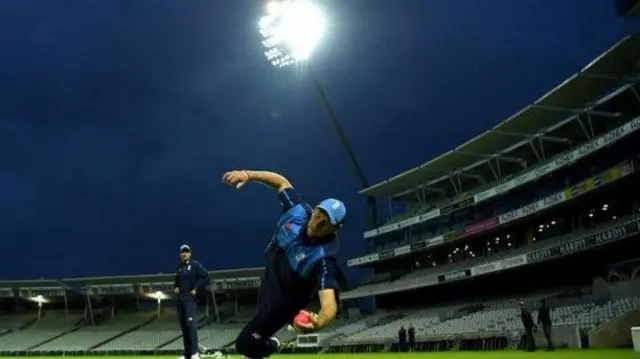 England captain Joe Root takes a catch during practice under the lights at Edgbaston