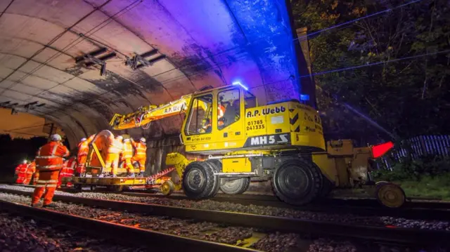 Cable being replaced by railway engineers