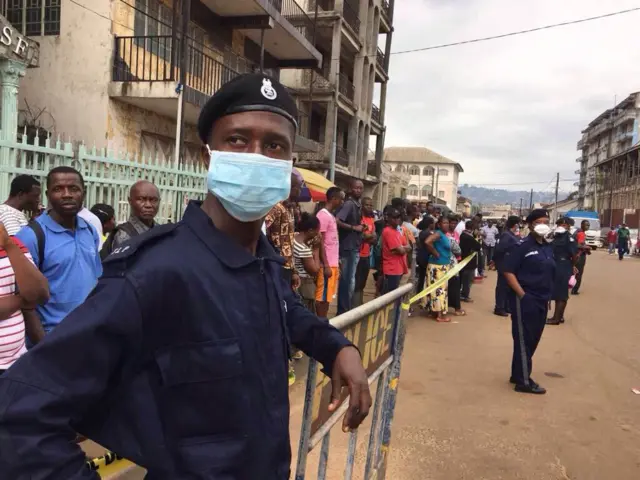 People seen outside University of Sierra Leone teaching hospital