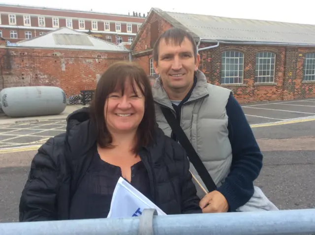 Caroline and Geoffrey Robinson wait for their son