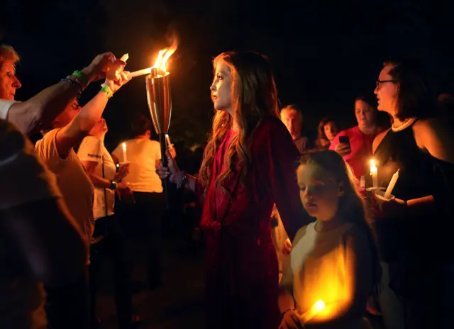 Lisa Marie Presley leads the vigil at Graceland