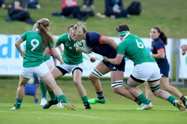 France's Romane Menager bursts through Irish defence for first try,.