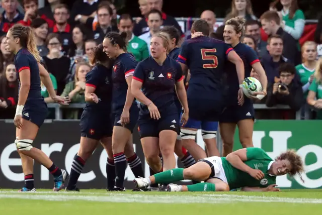 France celebrate as  Caroline Ladagnous scores another try.