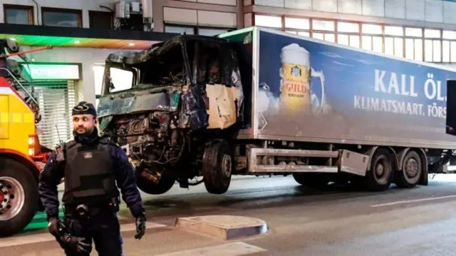 lorry being moved away from stockholm