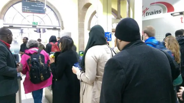 Train passengers at Stoke-on-Trent railway station