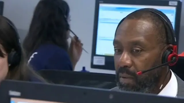 Lenny Henry taking phone calls