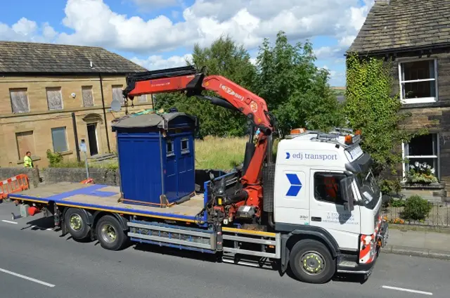 Almondbury Police Box being moved back into place