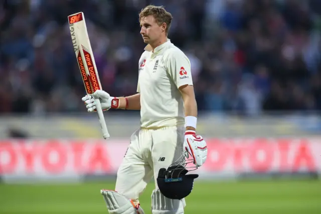 Root walks back to the pavillion