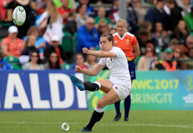 Emily Scarratt kick's a conversion