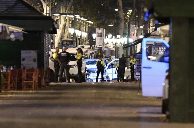 Police surround a damage white van