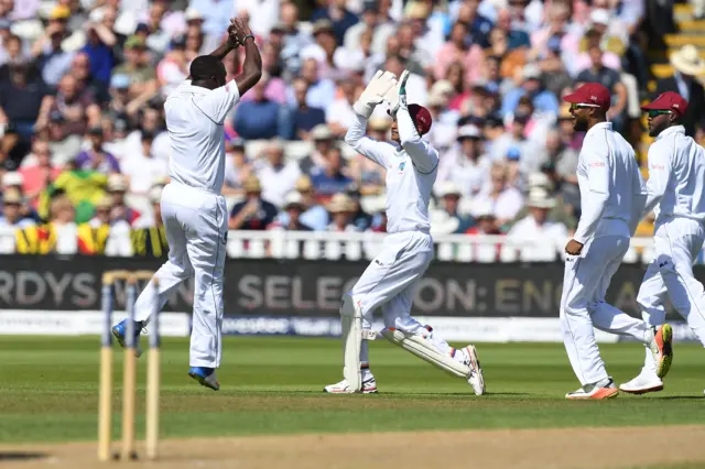 Roach celebrates wicket