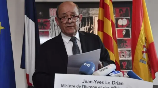 French ForeignMinister Jean-Yves Le Drian during a press conference in Barcelona on August 18, 2017