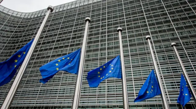 European Union flags fly at half-mast in honour of the victims of the 17 August terrorist attack in Barcelona, Spain, in front of the seat of the European Commission in Brussels, Belgium,