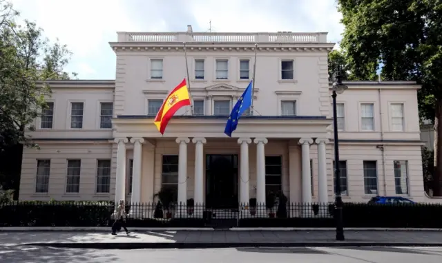 Flags fly at half mast outside the Spanish Embassy in London following yesterday's attacks