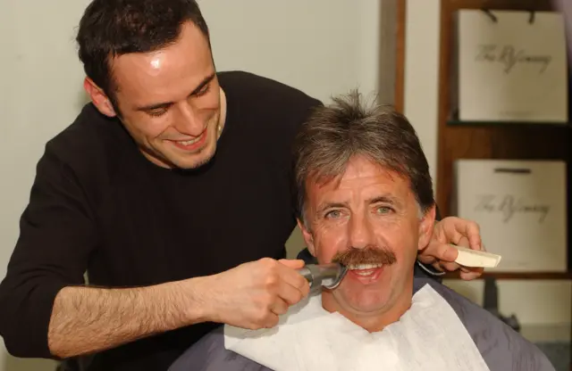 Mark Lawrenson getting shaved