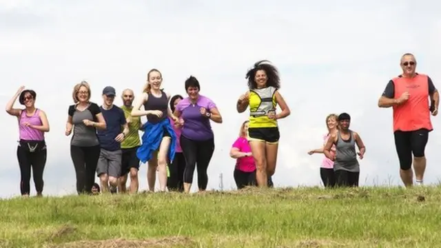 Runners taking part in a #TeamPersonalBest event