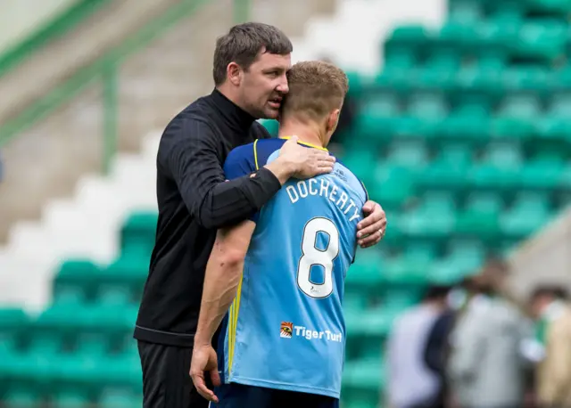 Martin Canning celebrates with Greg Docherty after Hamilton's win at Hibs