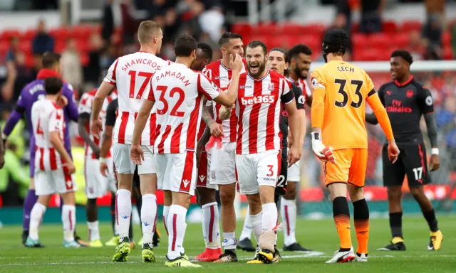 Stoke players celebrate at the final whistle